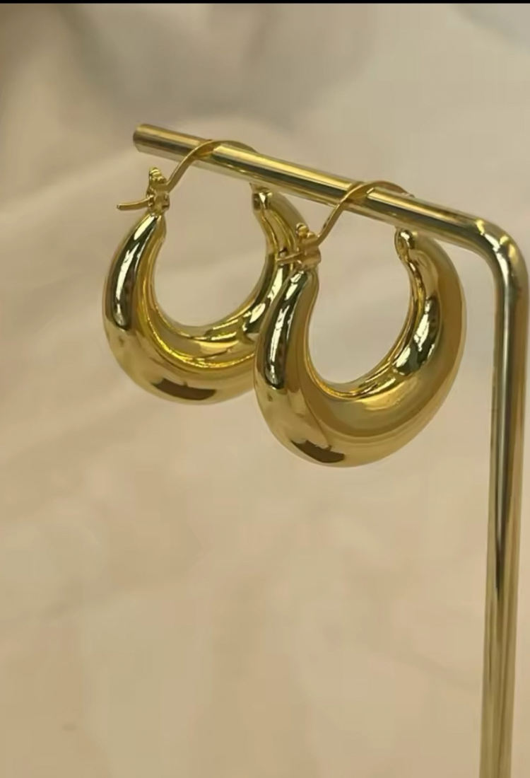 Golden medium huggie hoop earrings