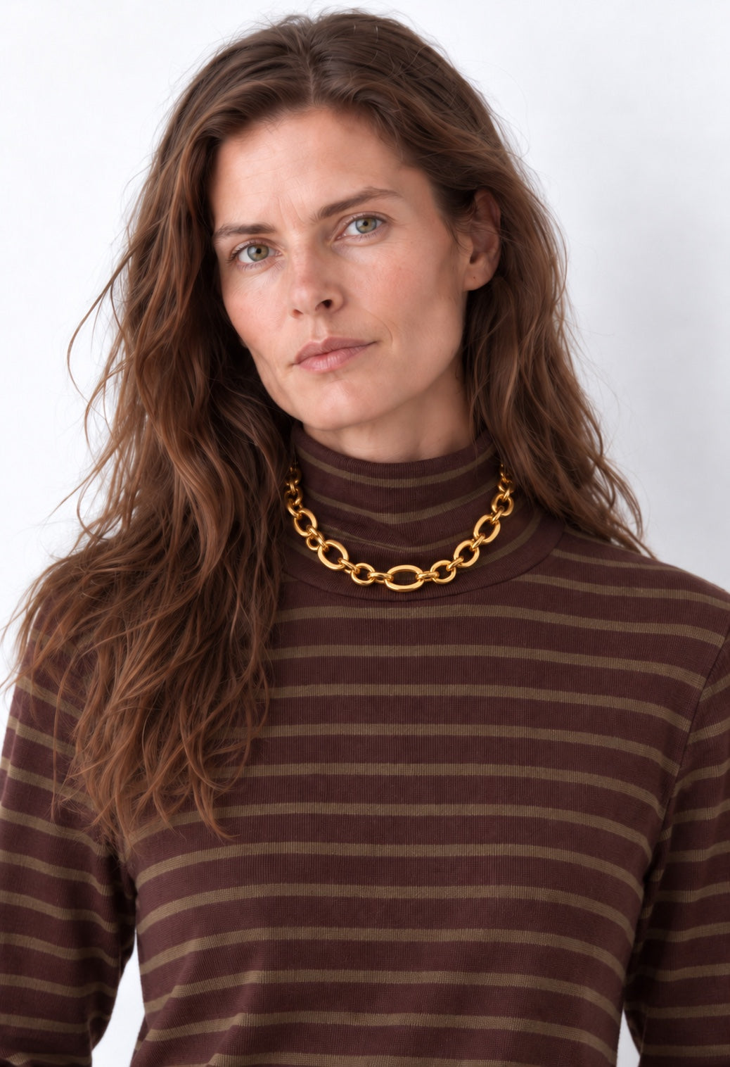 Gold-tone stainless steel link necklace worn on model