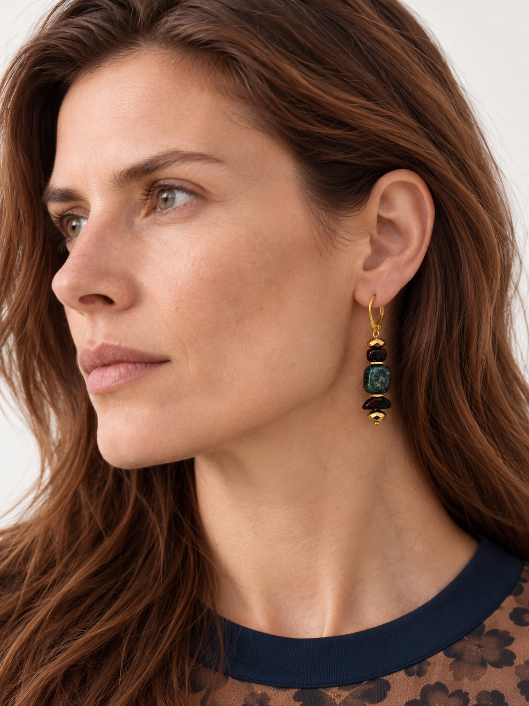 Maya natural jade earring worn on model